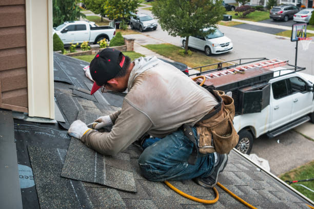 Professional Roof Replacement technician working in Sandgap, KY